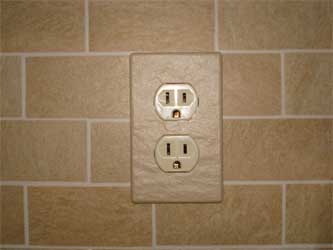 Magnetic ceramic electrical outlet cover