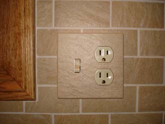 Magnetic ceramic switch and outlet cover plate