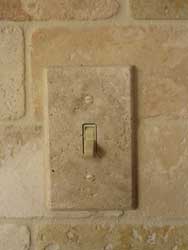 Installed travertine marble light switch cover plate