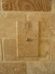 Installed travertine stone cable jack plate